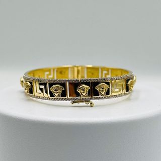 PULSERA RIGIDA MEDUSA ONIX GRECA Y CIRCON. Oro18K.