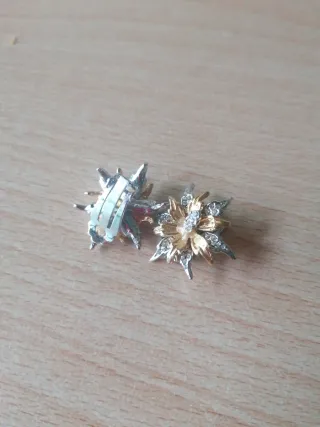 Pendientes flor dorados y plateados