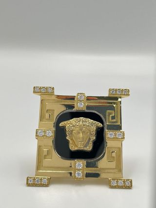 SELLO MEDUSA ONIX Y CORCONITAS. Oro 18k.