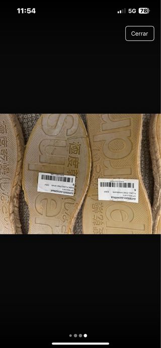 Alpargatas Superdry rosas y rojas