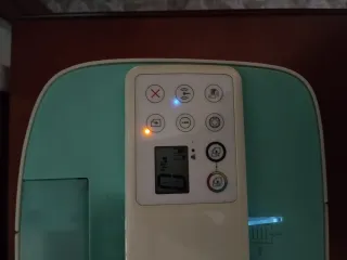 Impresora HP Verde y Blanca