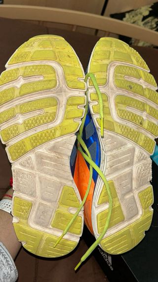 Zapatillas deportivas running naranja y amarillo