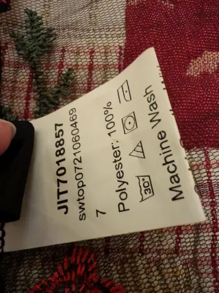 Top negro bordado flores