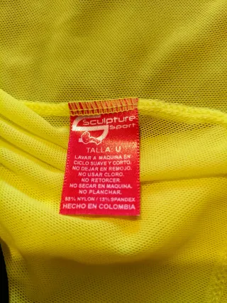 Chaqueta deportiva malla amarillo fluor