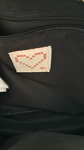 Mochila roja Parfois.