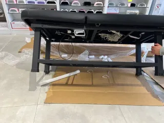 Camilla eléctrica negra ajustable en altura