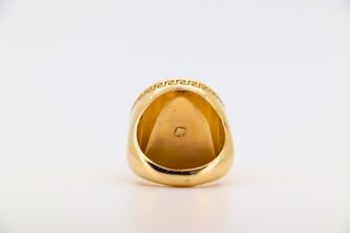 SELLO REDONDO MEDUSA ONIX CIRCONITAS GRECA Oro18K
