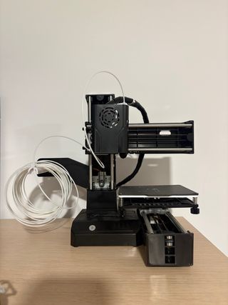 Mini impresora 3D negra (con un solo uso)