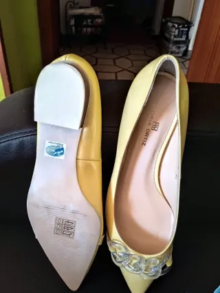 Zapatos planos Gloria Ortiz amarillos