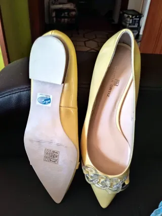 Zapatos planos Gloria Ortiz amarillos