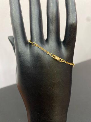 Pulsera esclava oro 18k con tréboles
