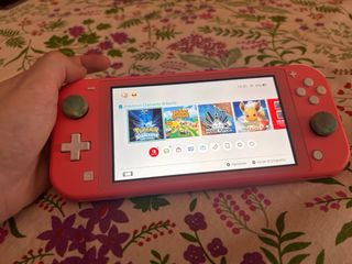 Nintendo Switch Lite Rosa + Animal Crossing