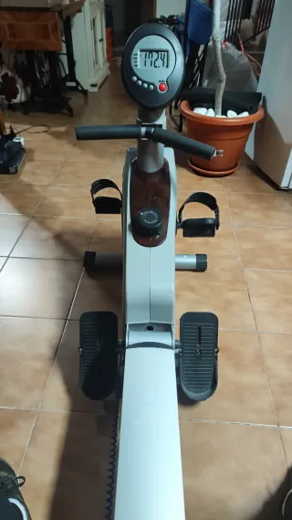 Bicicleta estática y remo plegable