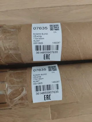 Dos estores de lino y algodón en blanco roto