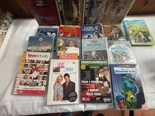 Lotto di 25 DVD misti e 13 cd musicali