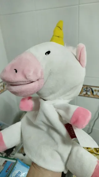 Juguete infantil de peluche rosa