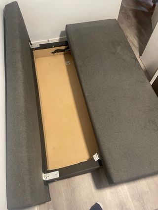 Sofá cama gris de tela