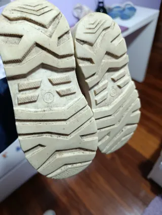 Botas rosas con corazones purourina y pelo.