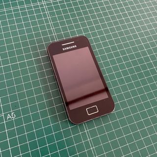 Samsung Galaxy Ace con cargador y caja