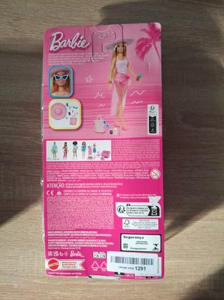 Barbie Muñeca Rubia con Traje de baño rosa y blanc
