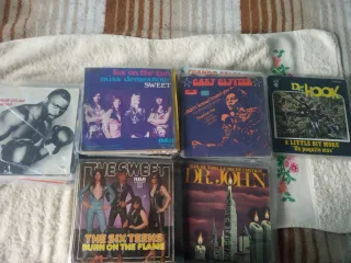 110 singles de música internacional y nacional