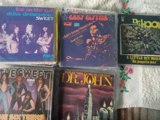 110 singles de música internacional y nacional