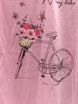 Pijama rosa y morado con bicicleta