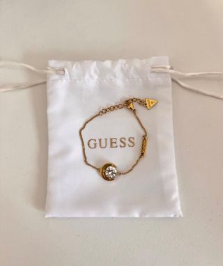 Pulsera Guess dorada con circonita