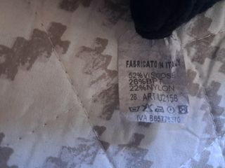 Jersey y blusa de punto acanalado negra de cuello