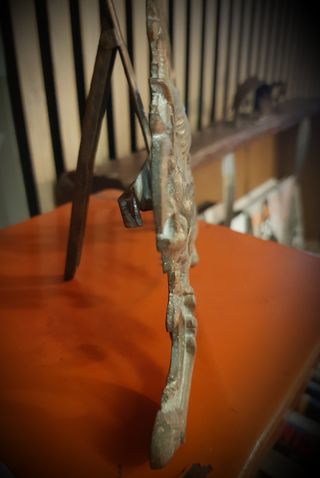 Antiguo portafotos de hierro fundido