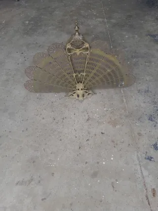 Precioso salvachispas de bronce