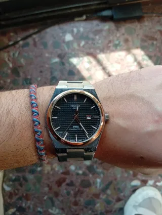 Reloj Tissot PRX Oro y Plata