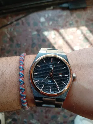 Reloj Tissot PRX Oro y Plata