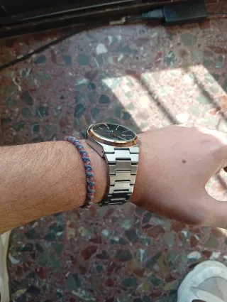 Reloj Tissot PRX Oro y Plata