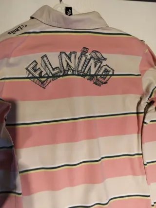 Polo marca El Niño rayas rosa y blanco