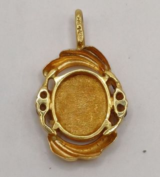 Colgante madre e hijo oro 18k, 1,35gr. Ref. G-948.