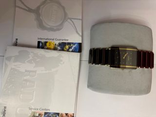 Reloj Rado Negro y Dorado