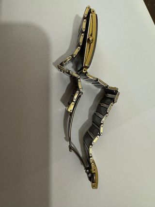 Reloj Rado Negro y Dorado