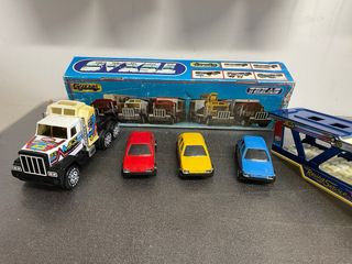 Camión Gozan Texas y 3 coches