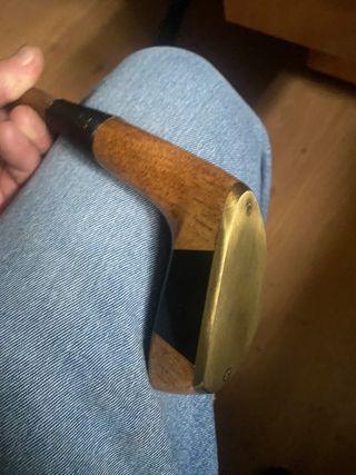 Putter de golf hickory y bolas antiguas