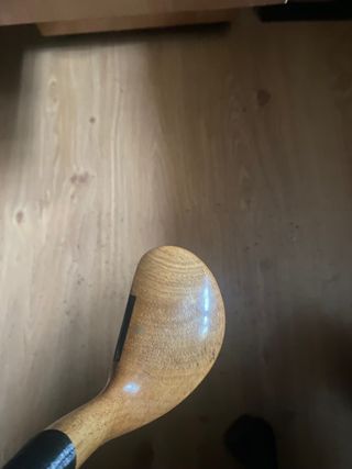 Putter de golf hickory y bolas antiguas