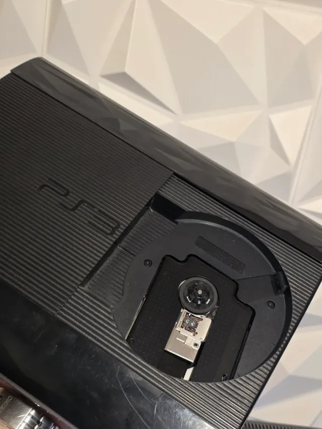 Consola PS3 12GB + 8 Juegos + Mando