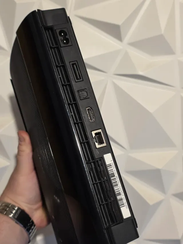 Consola PS3 12GB + 8 Juegos + Mando