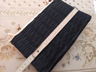 Pochette nera con pieghe