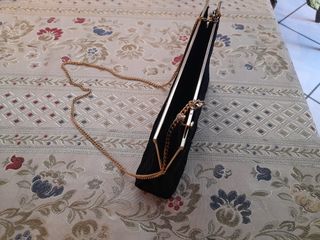 Pochette nera con pieghe