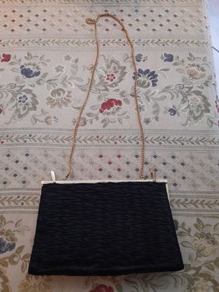 Pochette nera con pieghe