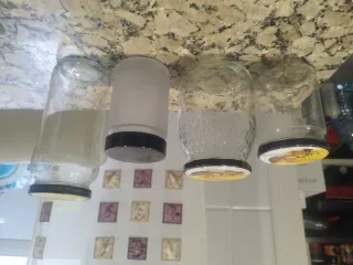 Botes de cristal con tapa metálica usados y limpio