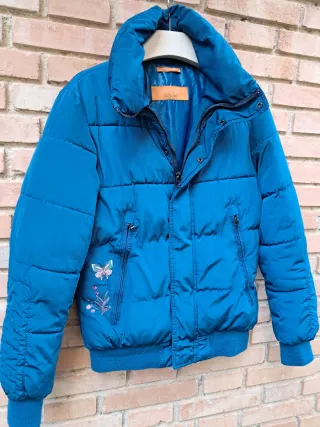 Preciosa chaqueta talla S color azul turquesa