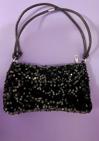 Bolso de lentejuelas negro y plateado