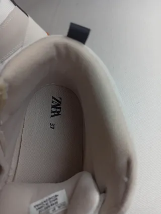 Zapatillas altas niño beige y blanco